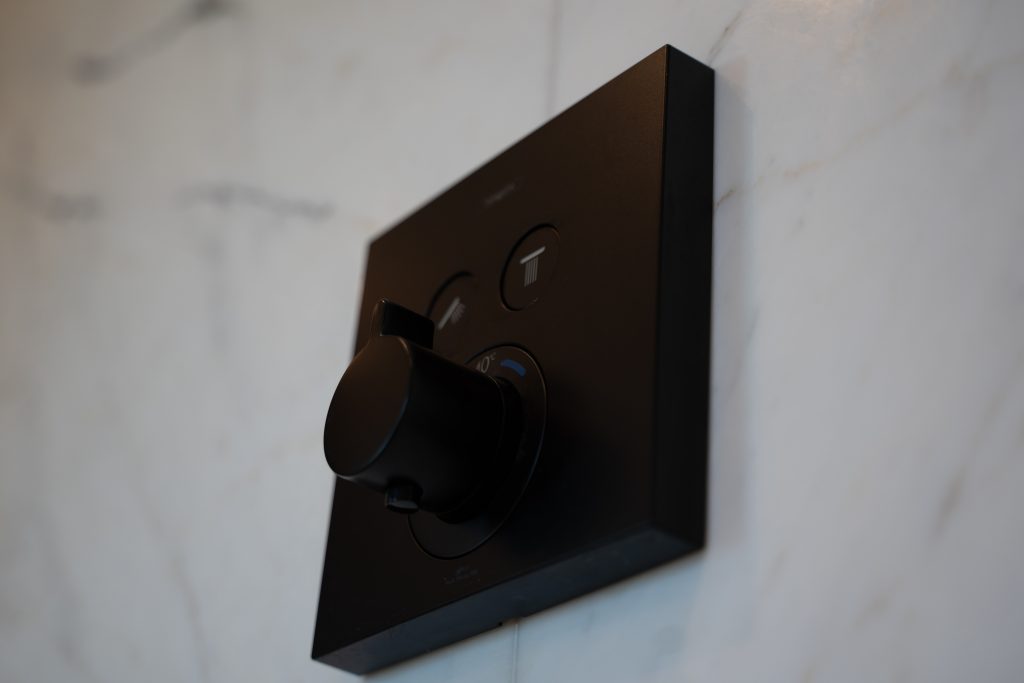black shower wall switch