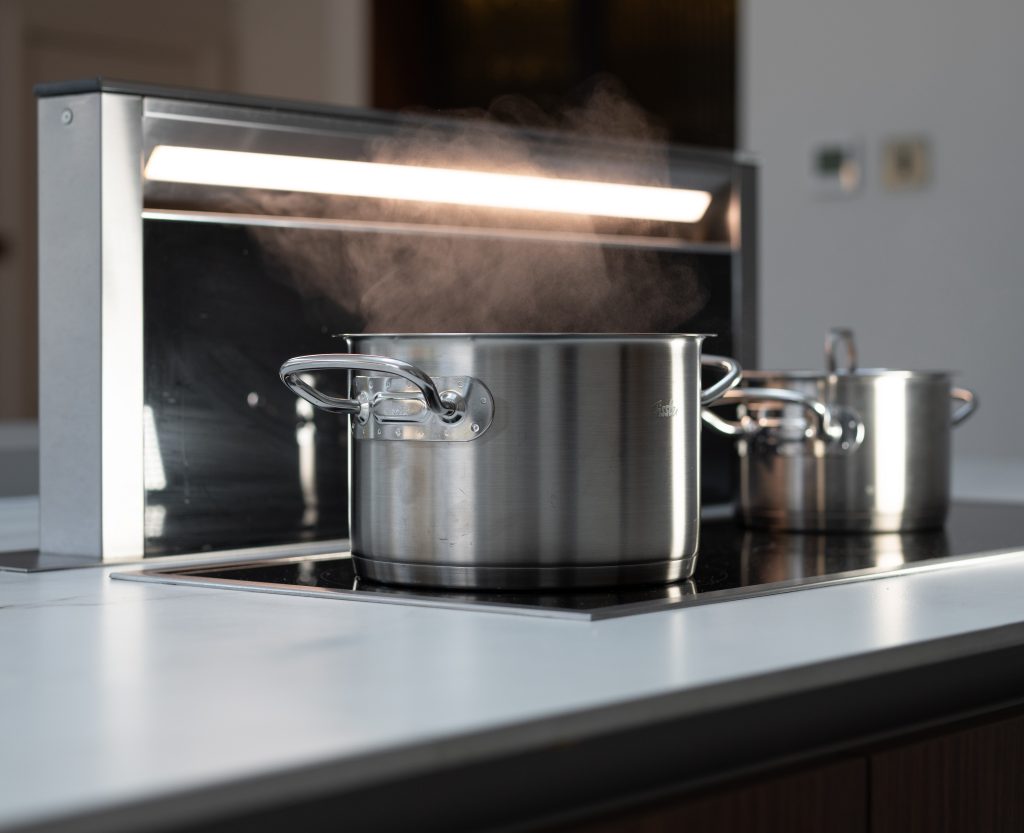 Pots cooking on a stove